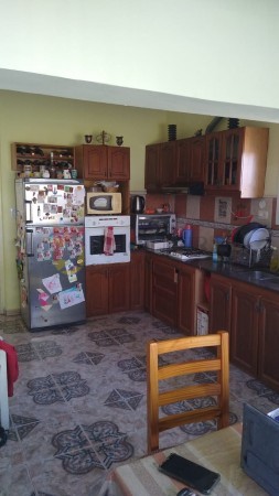 CASA EN PLENO CENTRO DE MUÑIZ, MUY BUEN ESTADO