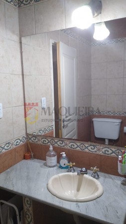 CASA EN PLENO CENTRO DE MUÑIZ, MUY BUEN ESTADO